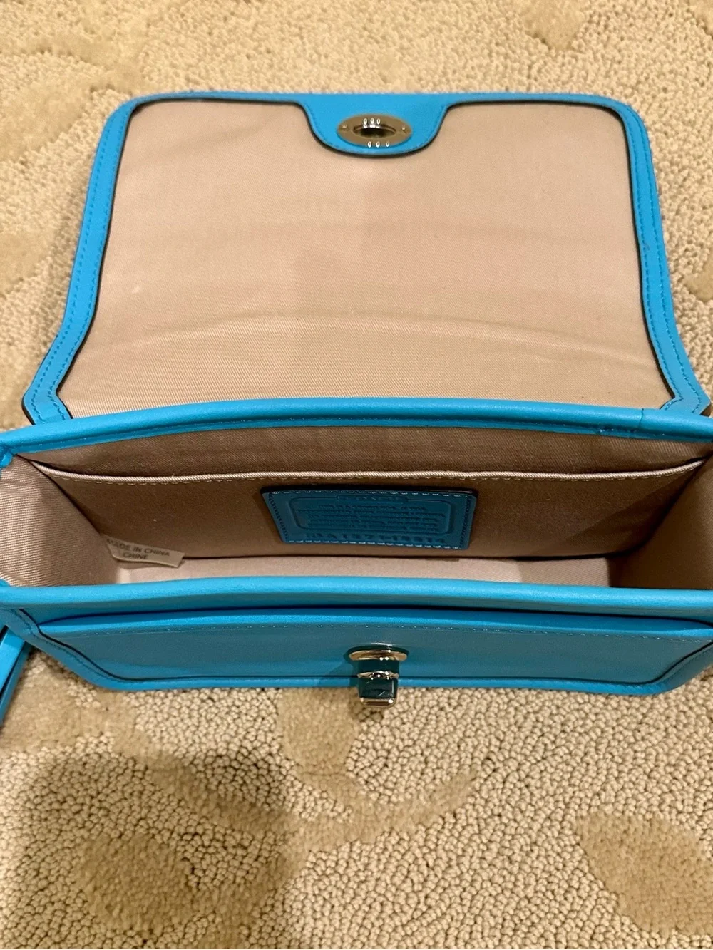 Coach Turquoise Leather Crossbody Bag with Tassel Accent
